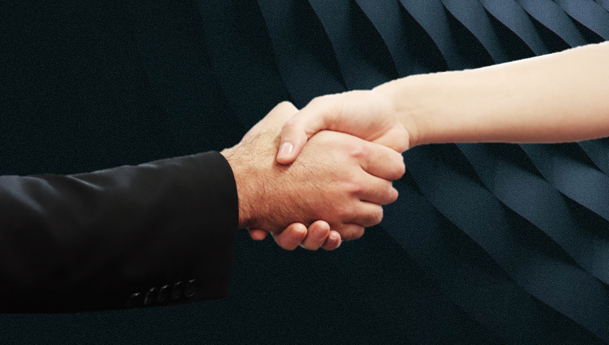 What is an “earnout” clause in a business acquisition?